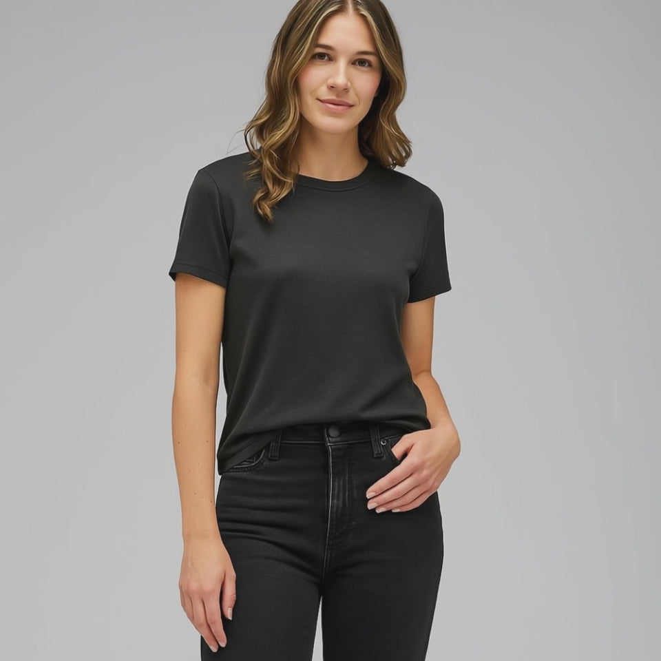 woman in black tech t-shirt – minimalist breathable fashion captured in 10-second video