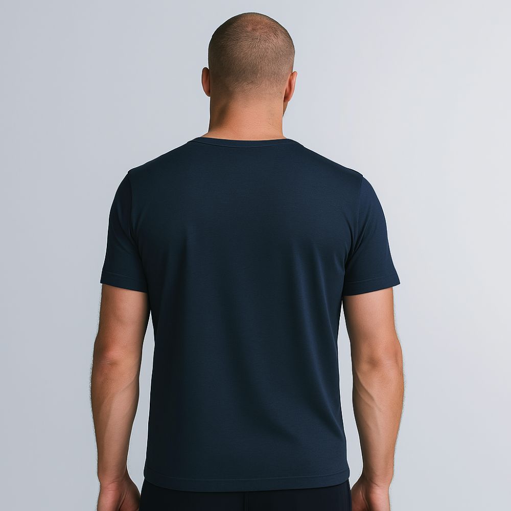 Rear view of man wearing navy blue Tech T-Shirt – Fioranzo Menswear, premium fit and finish