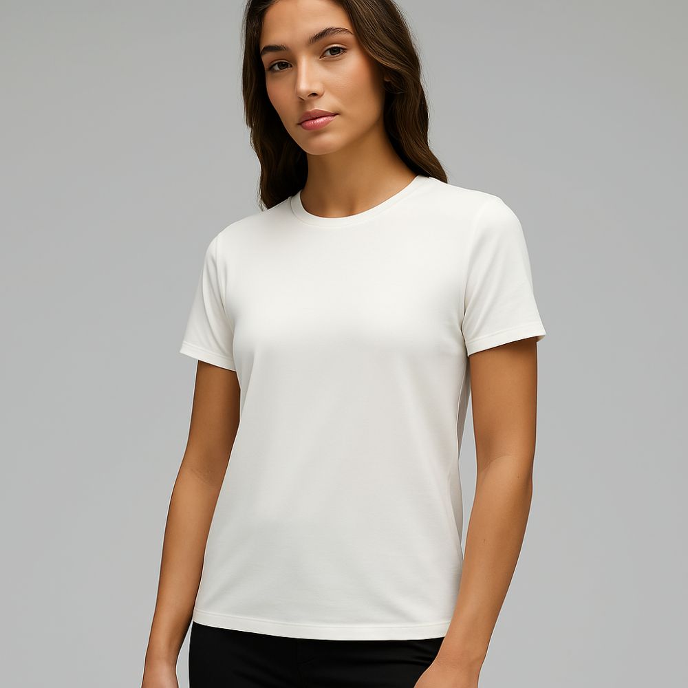 woman wearing white tech t-shirt – breathable minimalist fashion for gym, casual and everyday comfort