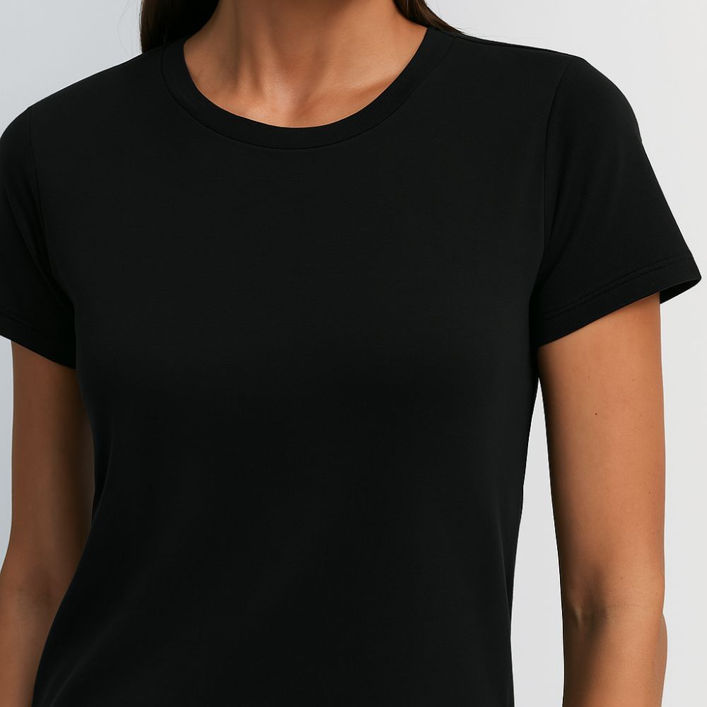 close-up of black tech t-shirt on woman – breathable quick-dry fabric for minimalist fashion and daily wear