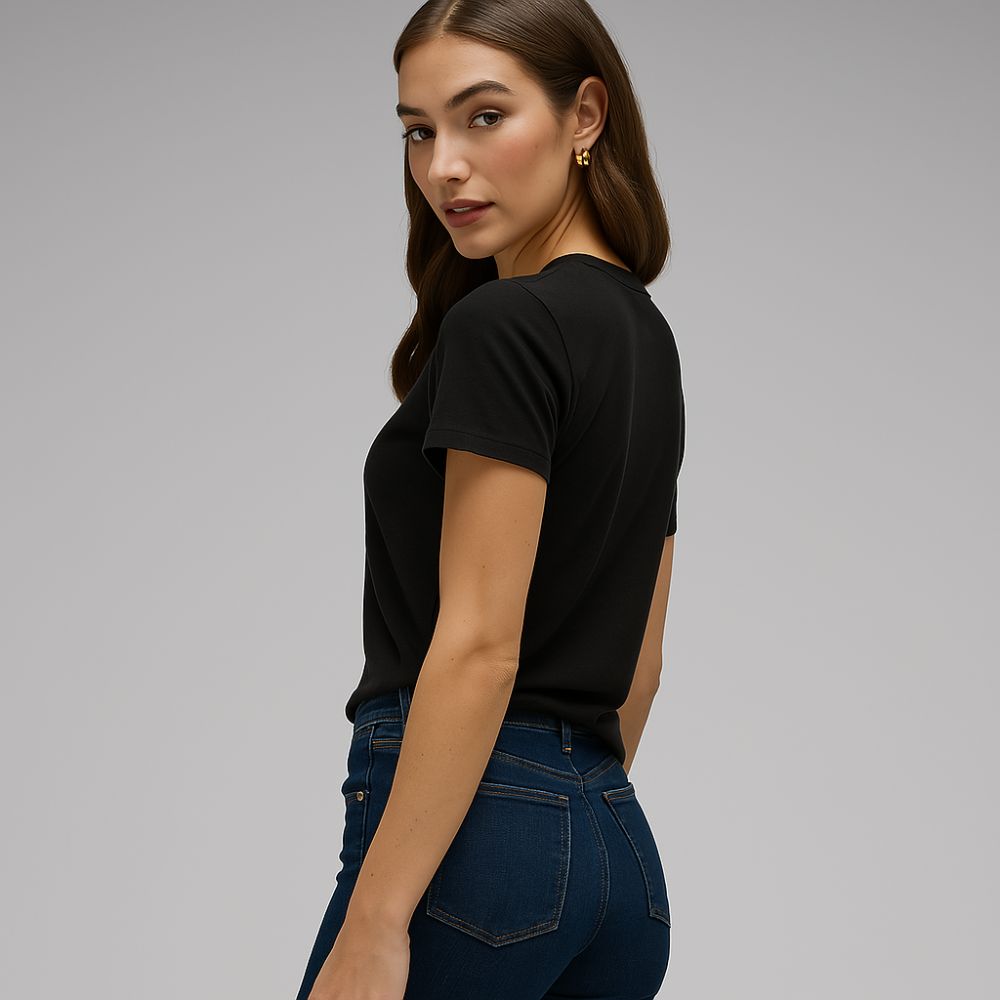 back view of woman wearing black tech t-shirt – lightweight breathable fabric for casual and minimalist fashion