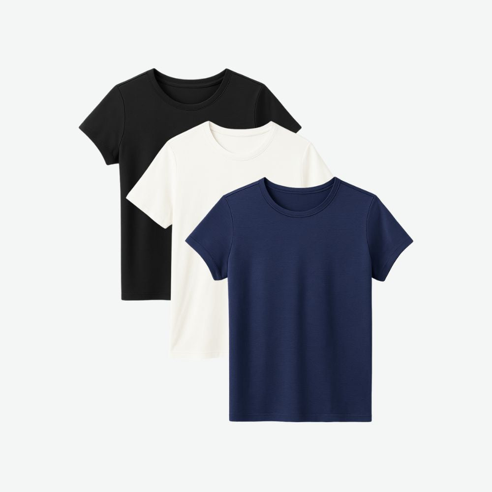 Three-pack of women’s t-shirts in black, white and navy blue with breathable cotton fabric and minimalist everyday fit