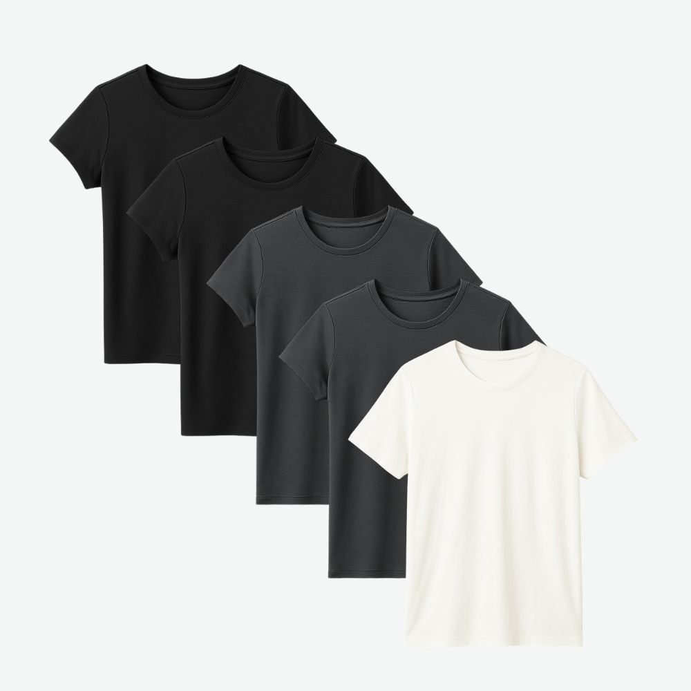 Four-pack of women’s t-shirts in black, grey and white, minimalist fit with breathable cotton fabric for daily comfort